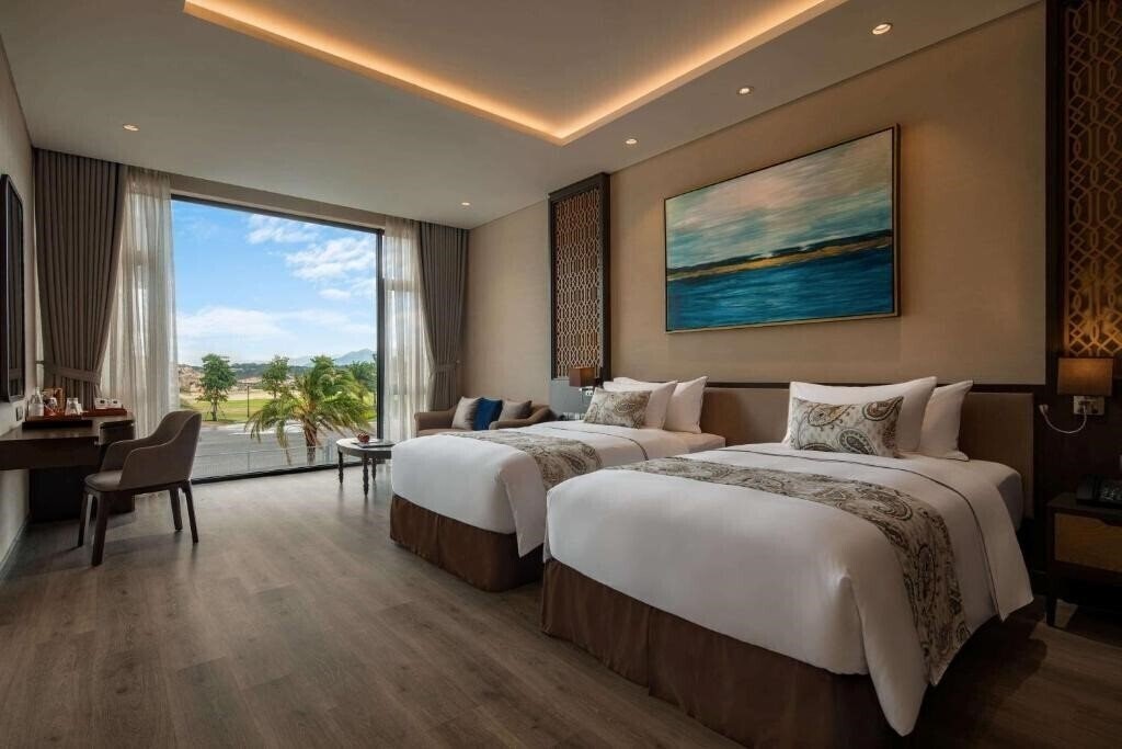 Фото Wyndham Grand KN Paradise Cam Ranh 5*