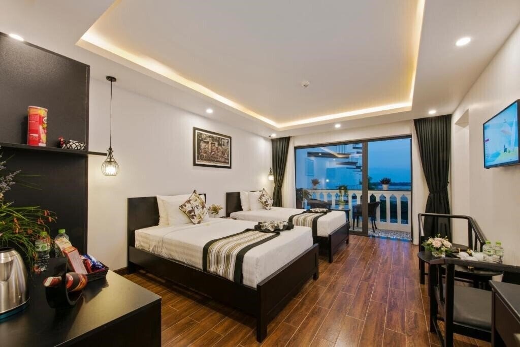 Фото Gem Riverside Hotel Hoi An 4*