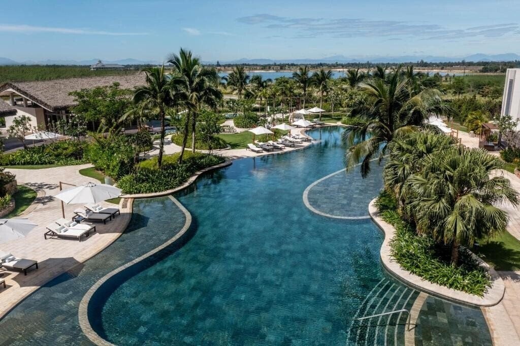 Фото New World Hoiana Hotel 5*
