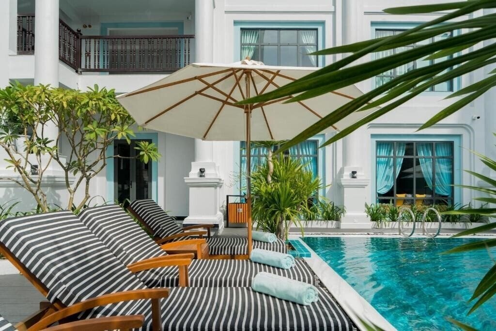 Фотографія Anio Boutique Hotel Hoian 4*