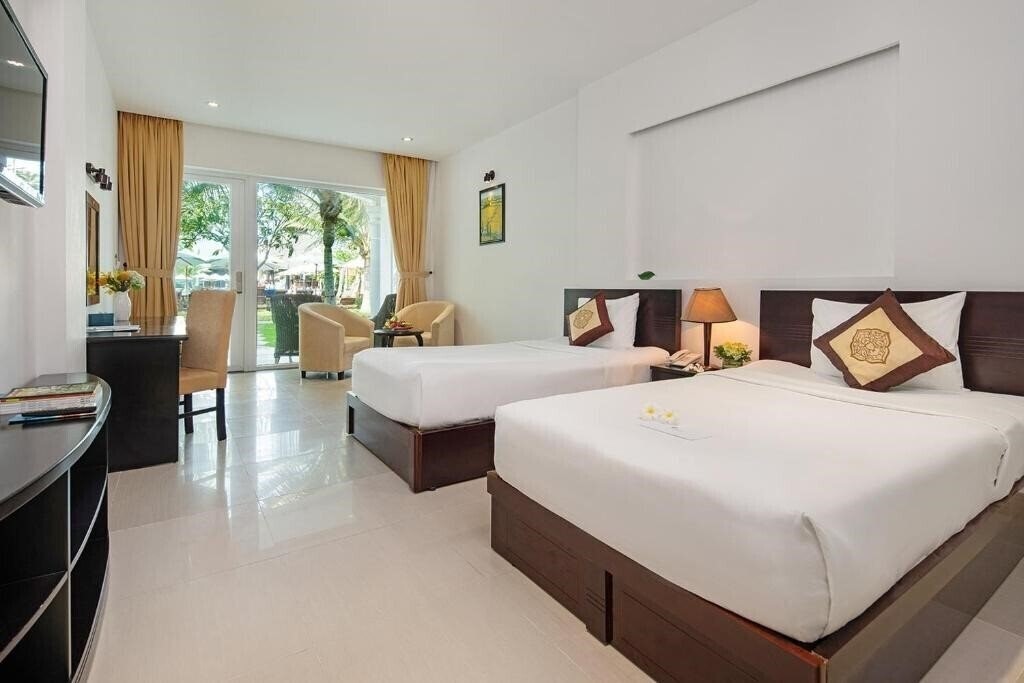 Фото The Sailing Bay Beach Resort 4*