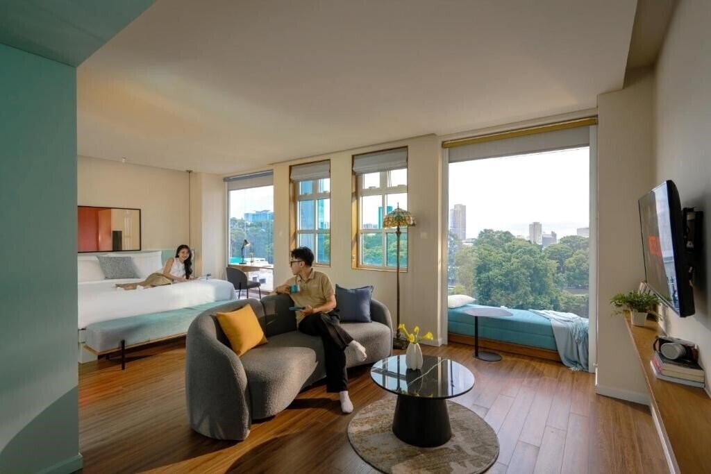 Фото M Village Hotel Tao Dan Park 4*
