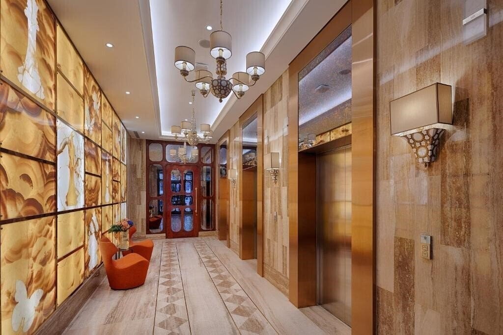 Фотографія Sherwood Suites 5*
