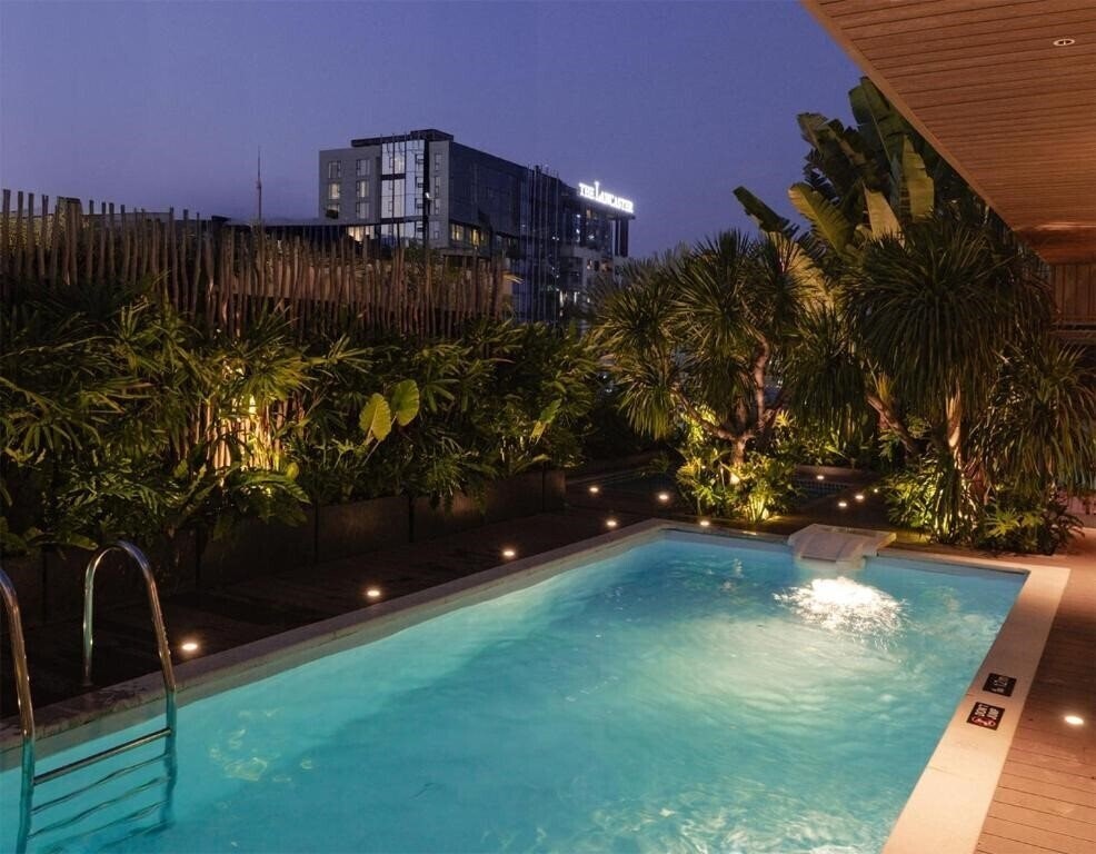 Фотографія M Village Hotel Premier Thi Sach 4*