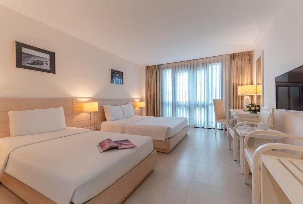 Фотографія Nhi Phi Hotel 3*
