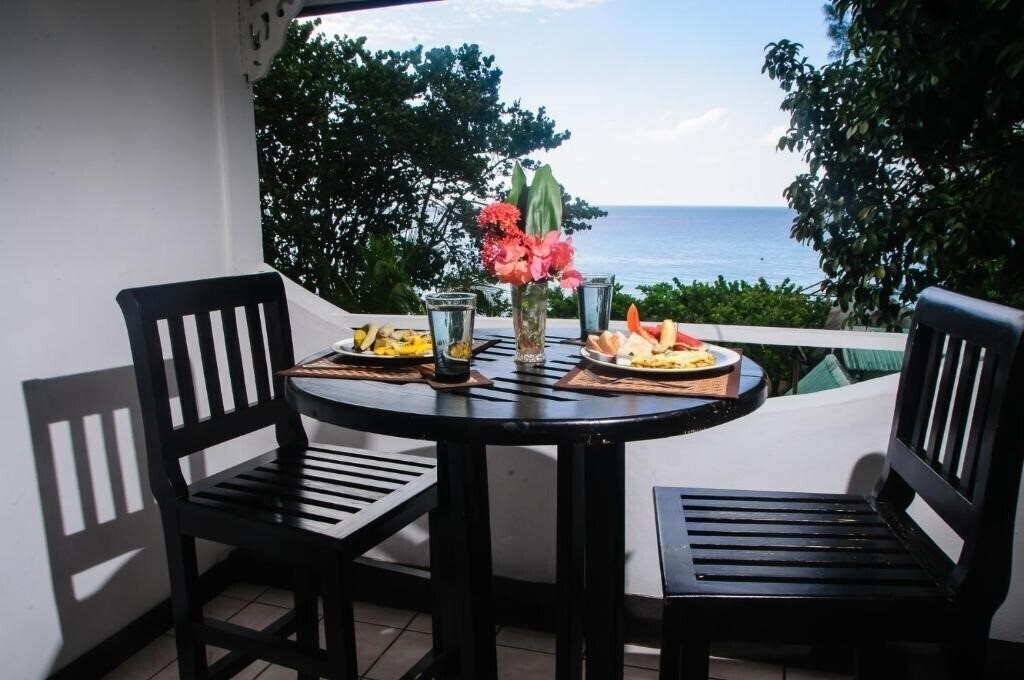 Фото Firefly Beach Cottages & Suites 3*