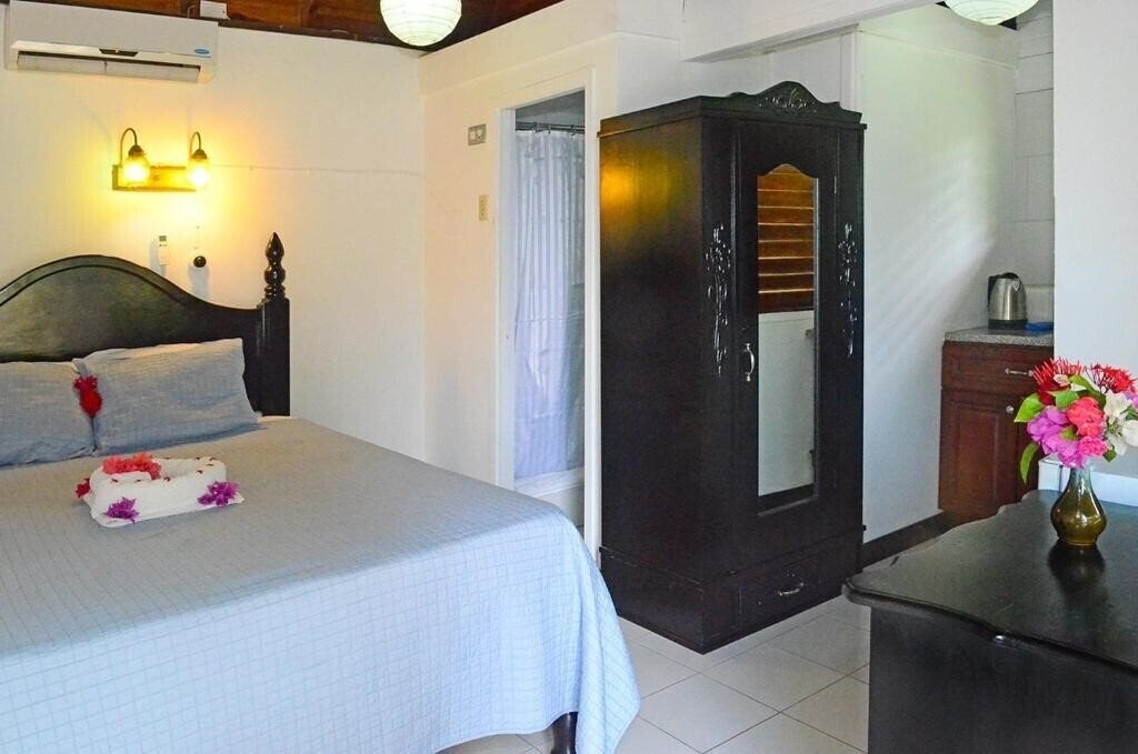 Фотографія Firefly Beach Cottages & Suites 3*