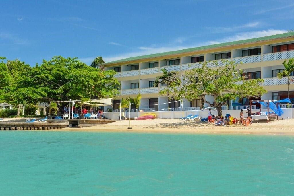 Фотографія Sand And Tan Beach Hotel 4*